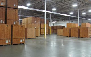 A large warehouse of wooden crates and boxes.